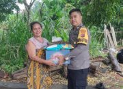 Bhabinkamtibmas Raiulun Salurkan Bantuan untuk Warga Nekto Dukung Pembangunan SD Kelas Jauh Ninma
